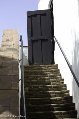 Stairs/Doorway to Balcony