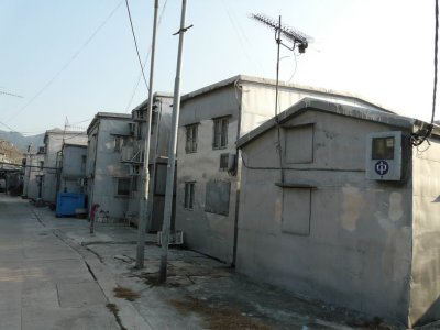 Restored stilted huts after fire at Sun Ki Street