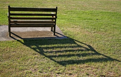 Shadow Throwing a Bench