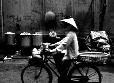 lady biker and cooking pots.jpg