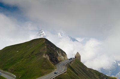 Fuscher Torl. Photograph from North side with peaks breaking through clouds.