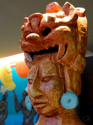 Jaguar Headdress And Blue Earrings