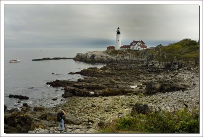 Portland Light and  Photographer  with  some sun trying to peek around the clouds