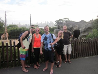 In front of the giraffes
