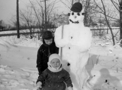 Mom, Uncle Bob, and snowman