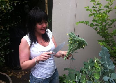Pam harvesting her broccoli