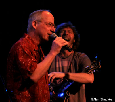 Sam Bush is amused by his introduction by Sierra Nevada's Bob Littell