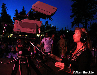 Video crew member capturing the action