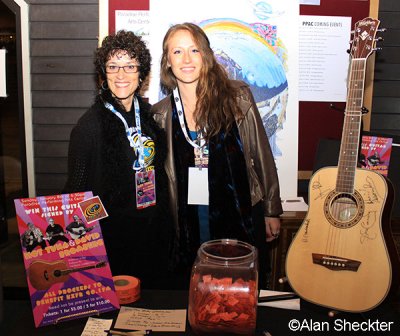 Before the show, Debra and Miranda by the autographed guitar, to raise funds for KZFR