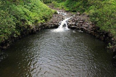 Water flows into a natural pool