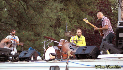 Members of Huckle jam atop an RV - Simon 'Huckle' Kurth, Ezra Lipp, Murph