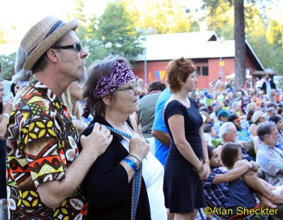 Joe Craven watching Ani Difranco, Meadow Stage