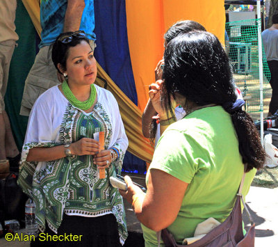 Quetzal's Martha Gonzales chats with Anna. 