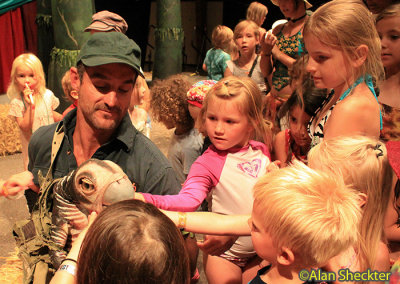 Kids get to pet ERTH's baby Dryosaur