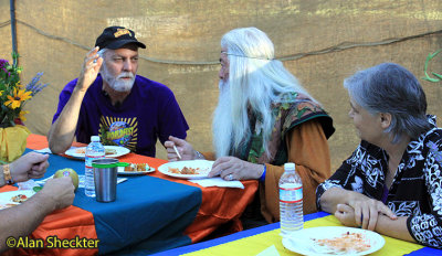 Professor Merloch Silvermaine chats with festival directors Dan DeWayne and Christine Myers