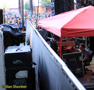 Video director Dan Carter works next to the Meadow Stage