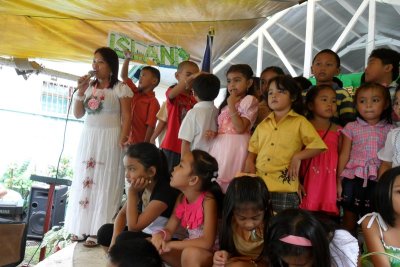 The principal welcoming the 6th graders.JPG