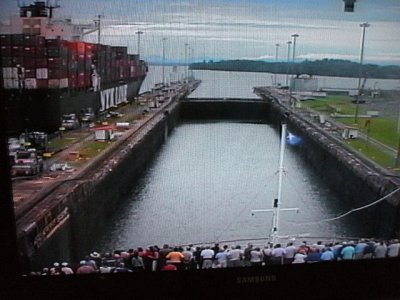 Panama Canal -front camera view of ship going in the Gatun Locks, rising up with the water