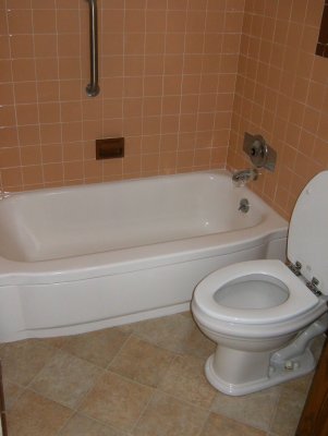 The tub was re-enameled, it used to be dark salmon!