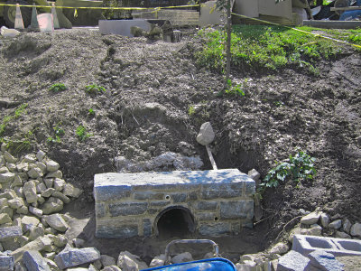 Another drain, faced with stone.