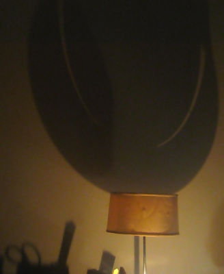 A blacked-out lamp, by candlelight<br>4708