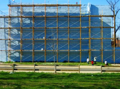 Scaffold for a mural, with its shadow