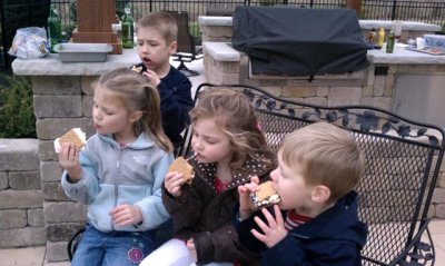 s'mores with friends ava and jack- not a lot of talking going on