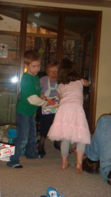 helping grandma open presents