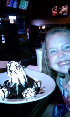 the gigantic dessert- see the crazed delight in her eyes!