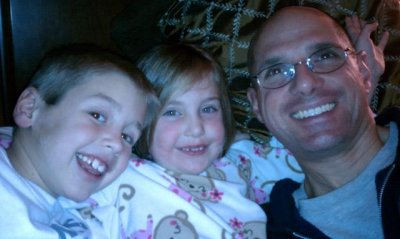 snuggles during family story night