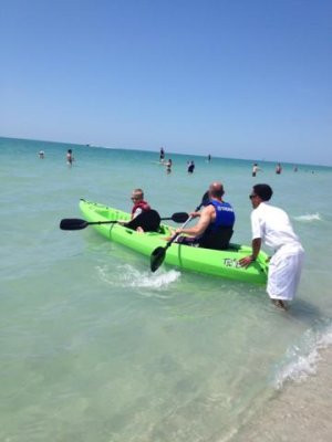 the boys rent a kayak