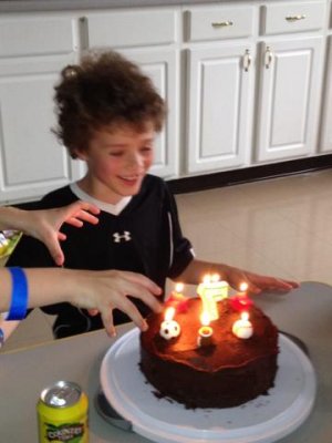 joey's birthday party- he got all shy when the candles were lit, so his buddy peter didn't hesitate to jump in!