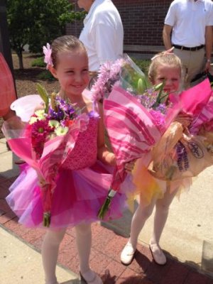 girls with their congratulatory flowers