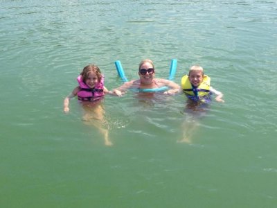 me and the kids.  my chin looks like it is part of the lake