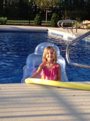happy girl in the pool