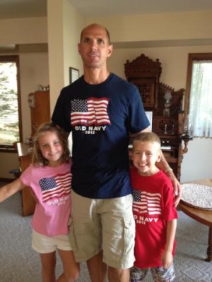 patriotic family at the lake