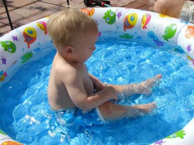 splashing in his new baby pool