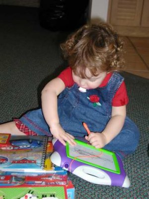 checking out her new toys