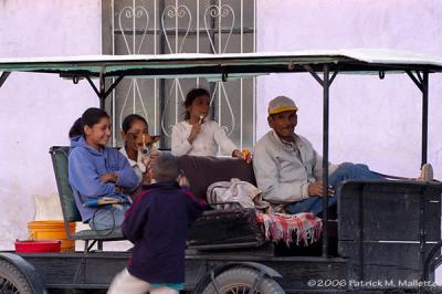 Family in horse-drawn cart