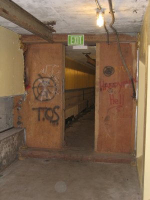 Preservation work: Non-historic interior wall, before demolition