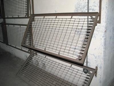 Prison-type suspended bunks. The same design was used inside Battery Townsley proper.