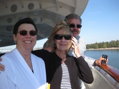 Patti, Patti, Ed at the bow as we leave Finland