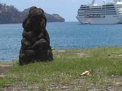 Totem and ship from Nuku Hiva