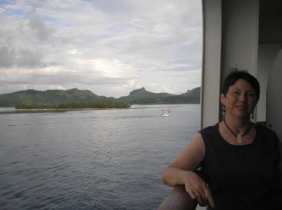 Patti on balcony with Bora Bora behind us