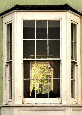 Sneaking a peek through an old-fashioned window