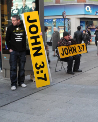 John sitting, John standing