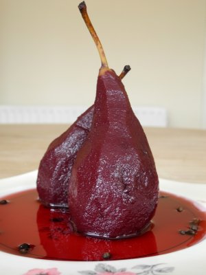 The luscious juiciness of pears in red wine sauce with peppercorns
