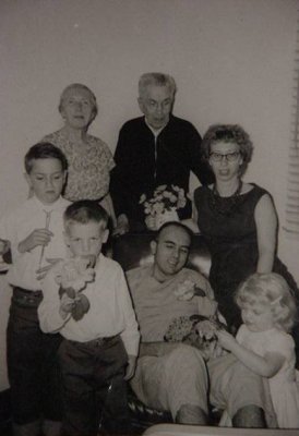 family in early 60's visiting dad at the VA hospital