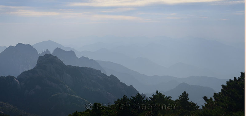 Panorama of Turtle and Lotus Stamens Peaks from Bright Summit Huangshan mountain China