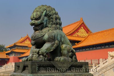 Bronze female lioness with baby at the Gate of Supreme Harmony in the Forbidden City Beijing China